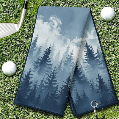 Golf towel with forest design on grass with golf balls and club